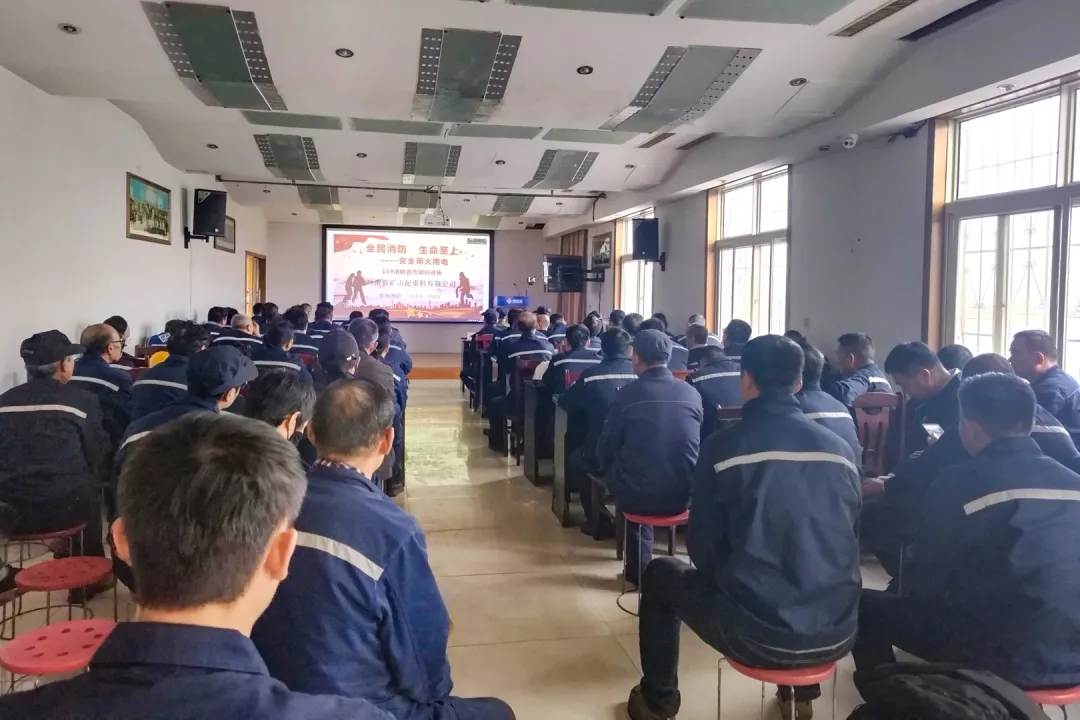 Employees following a fire-safety lesson in a smaller room