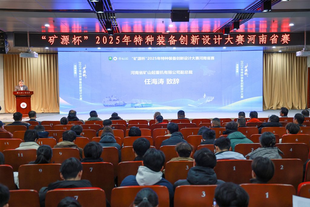 Academic speaker addressing competition participants