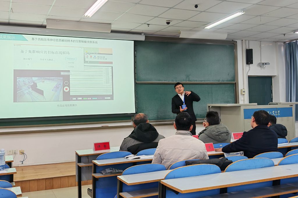 Contestant explaining a projected engineering design