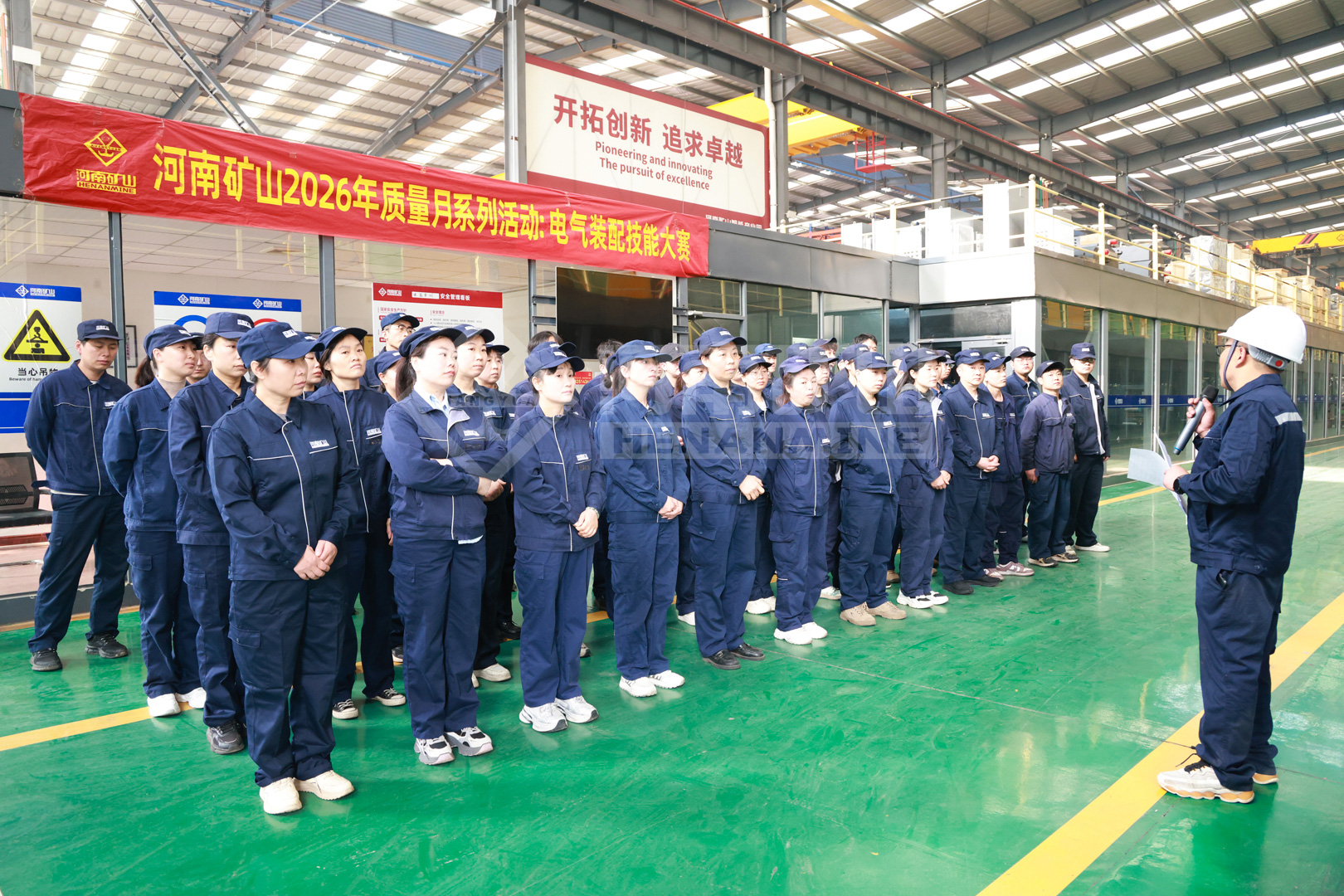 Employees assembled before the electrical assembly competition