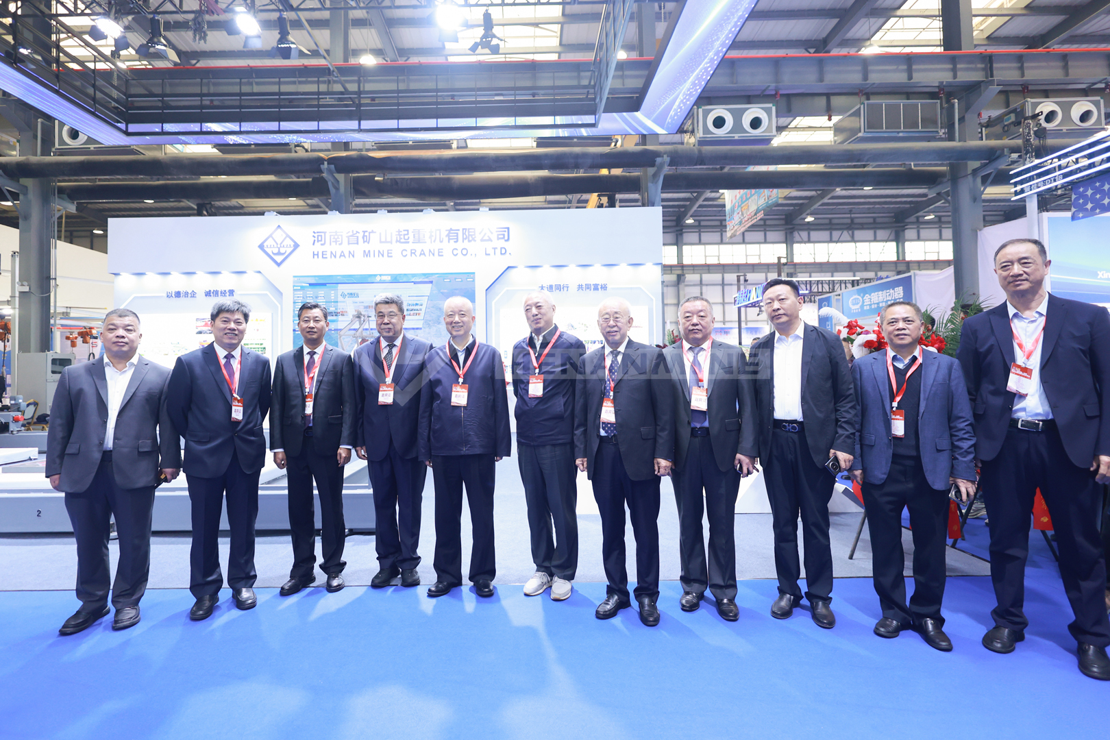 Company and industry representatives at the exhibition stand Company and industry representatives at the exhibition stand