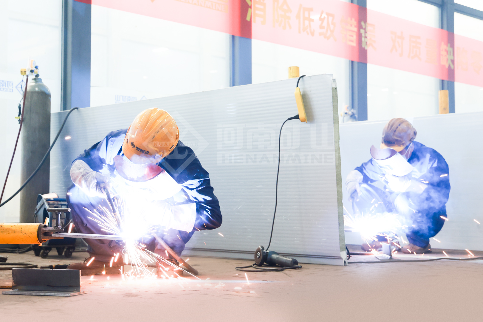 Participants carrying out welding exercises