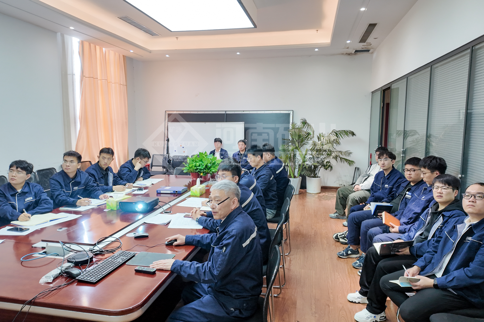 Employees reviewing technical requirements during a training session