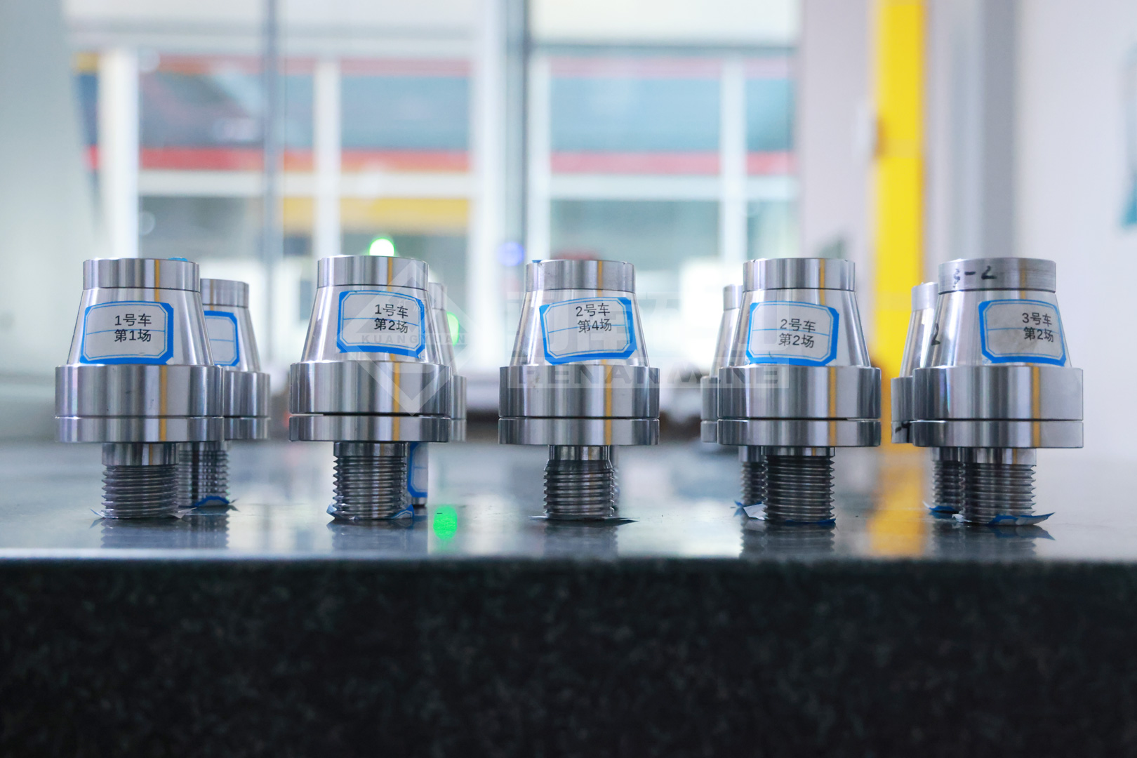 Precision-machined workpieces arranged for inspection