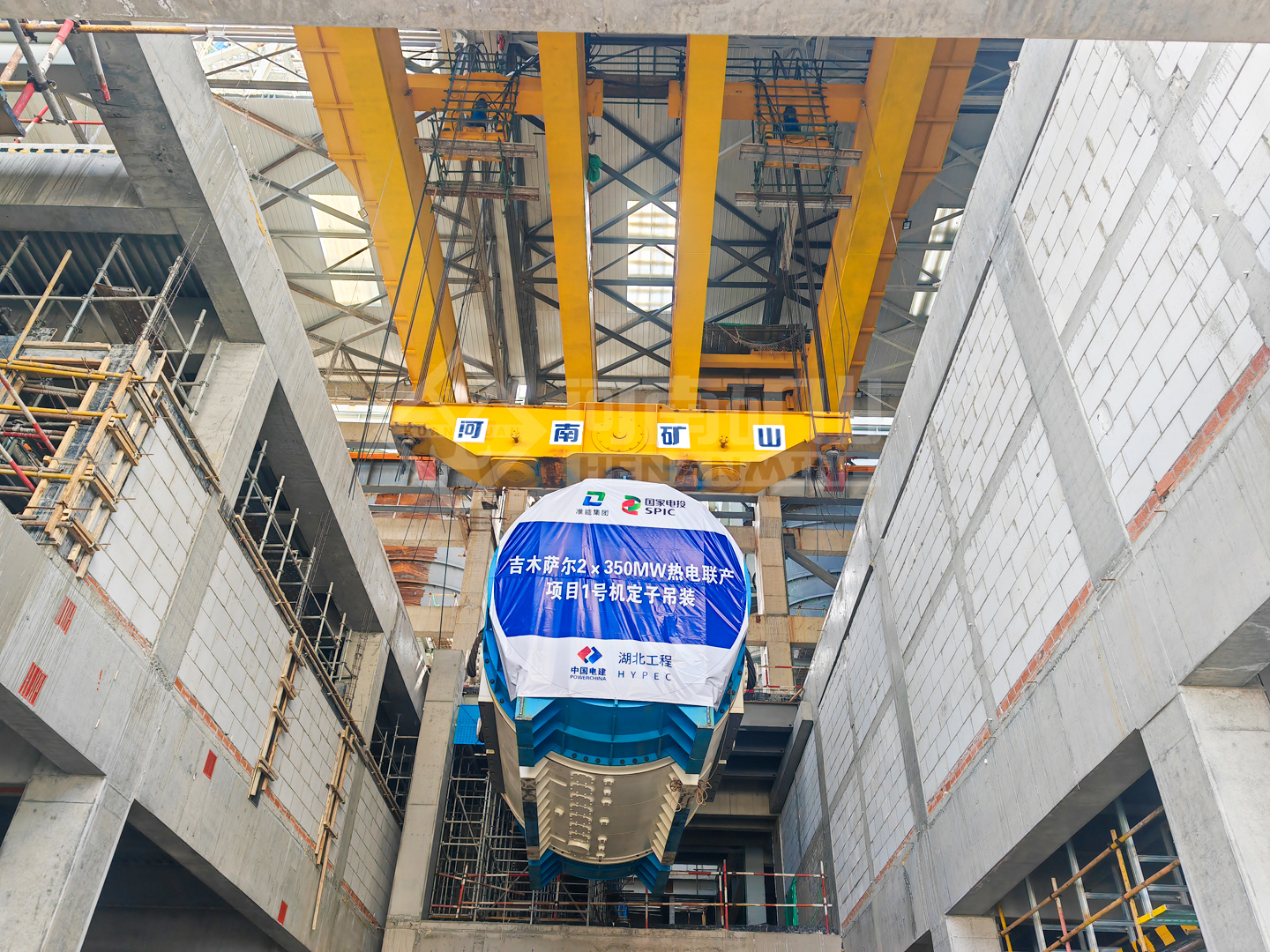 Overhead crane above generator equipment at the Jimusar project