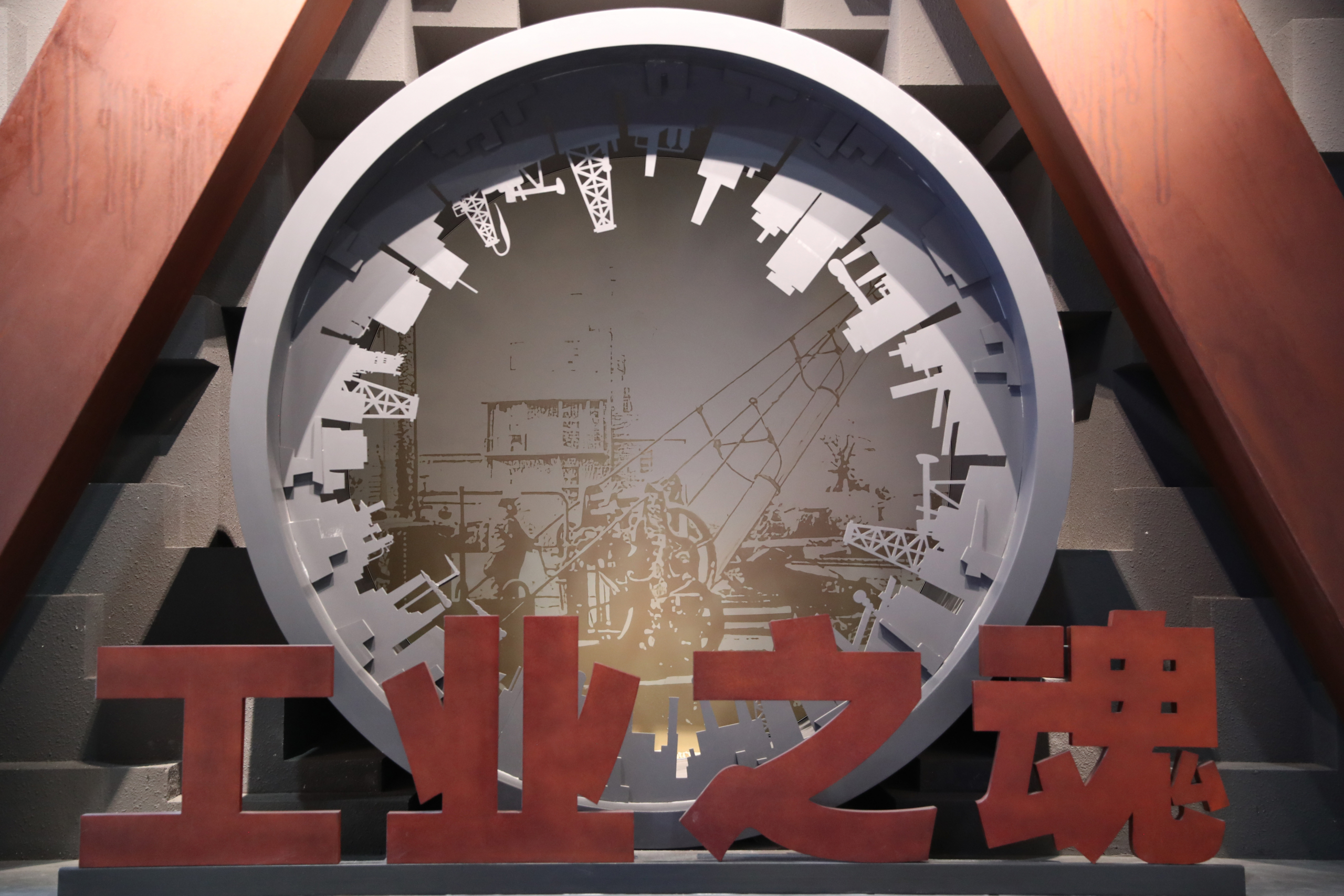Gear-shaped industrial history exhibit in the crane museum