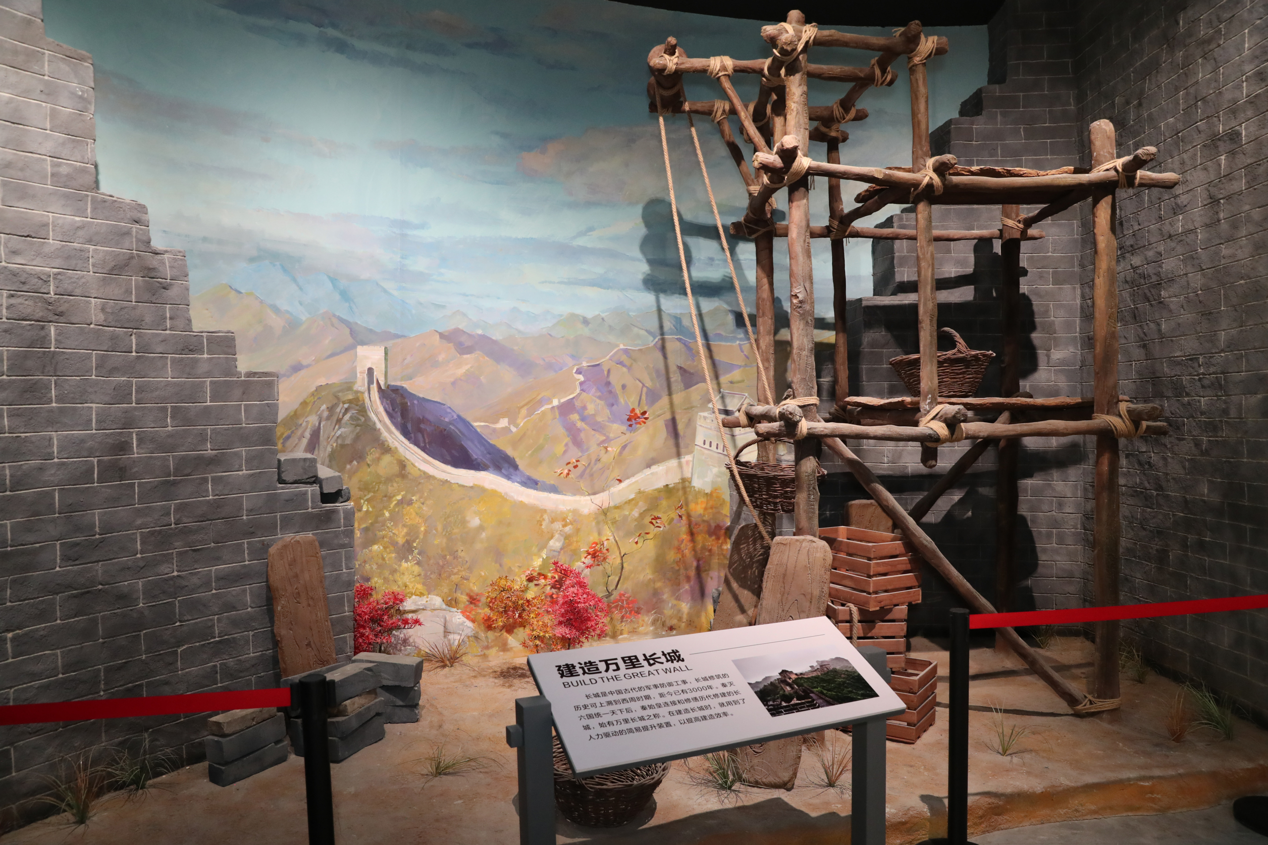 Reconstructed ancient lifting equipment in a museum scene