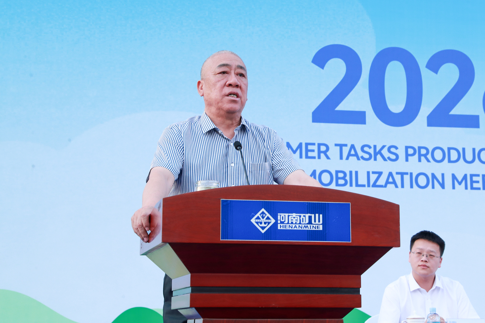 Henan Mine Crane representative speaking at the harvest-season event