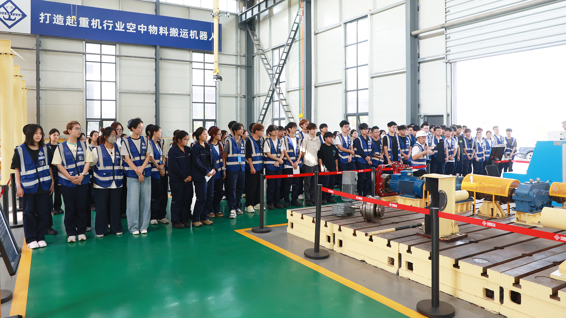 Interns visiting a crane equipment demonstration area