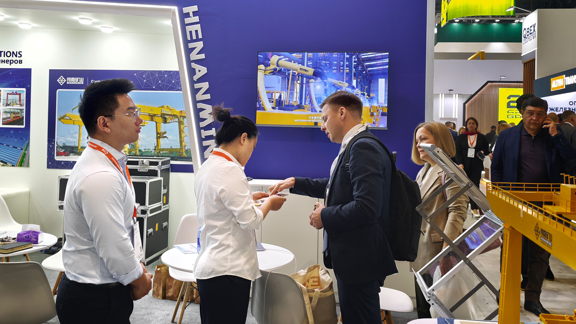 International visitors discussing crane applications with Henan Mine Crane staff International visitors discussing crane applications with Henan Mine Crane staff