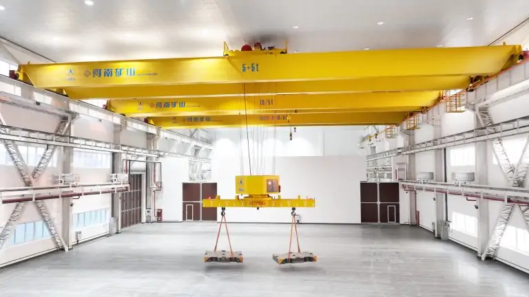 precision aerospace crane integrated with a high-clearance hangar building